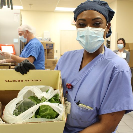 Colleagues-Packing-Food-Boxes.jpg